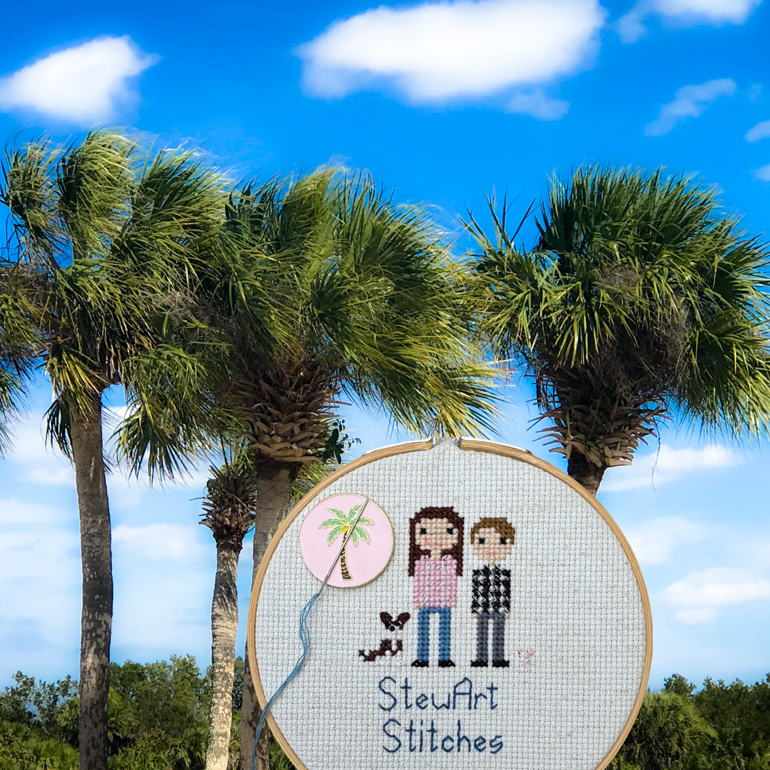 A round magnetic needle minder with a palm tree and a pink background. 