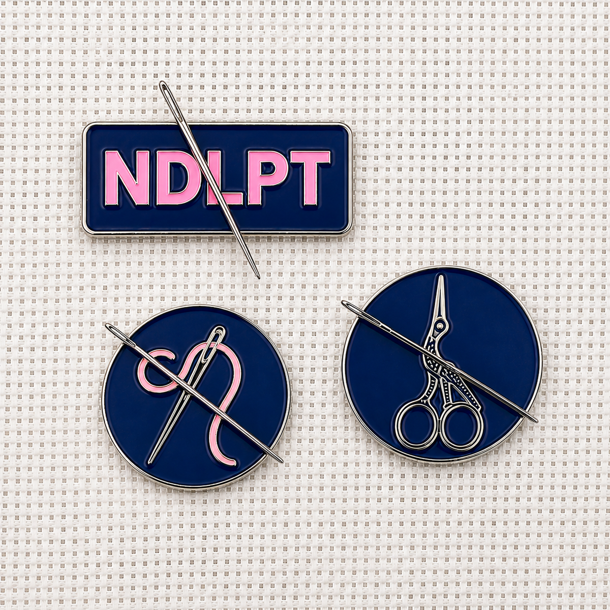 Set of 3 needlepoint  themed enamel needle minders for cross stitch, embroidery, and needlepoint – fun stitching gift for travelers and adventure lovers.