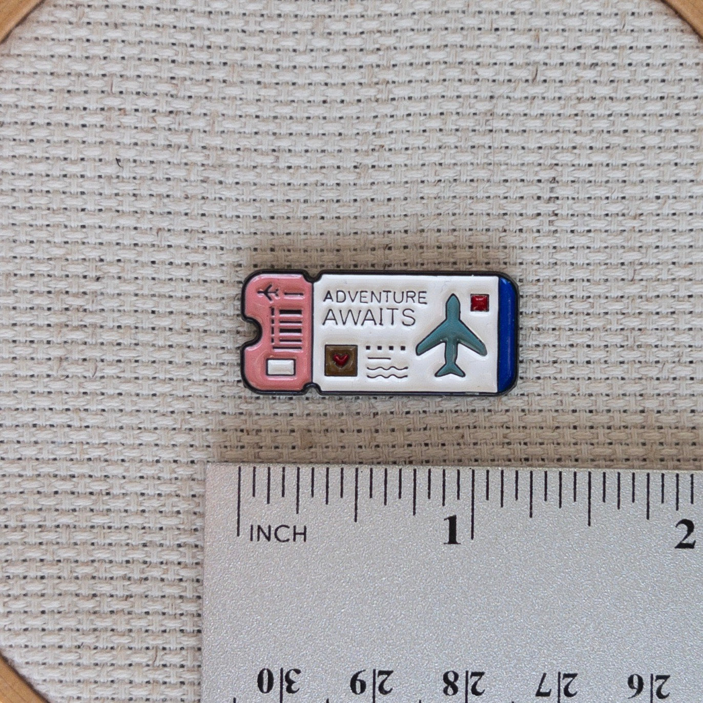 Airplane ticket magnetic needle minder – travel themed enamel accessory for cross stitch, embroidery, and needlepoint – fun stitching gift for travelers and adventure lovers.