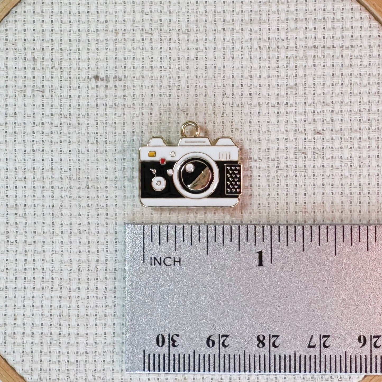 Camera magnetic needle minder – travel themed enamel accessory for cross stitch, embroidery, and needlepoint – fun stitching gift for travelers and adventure lovers.