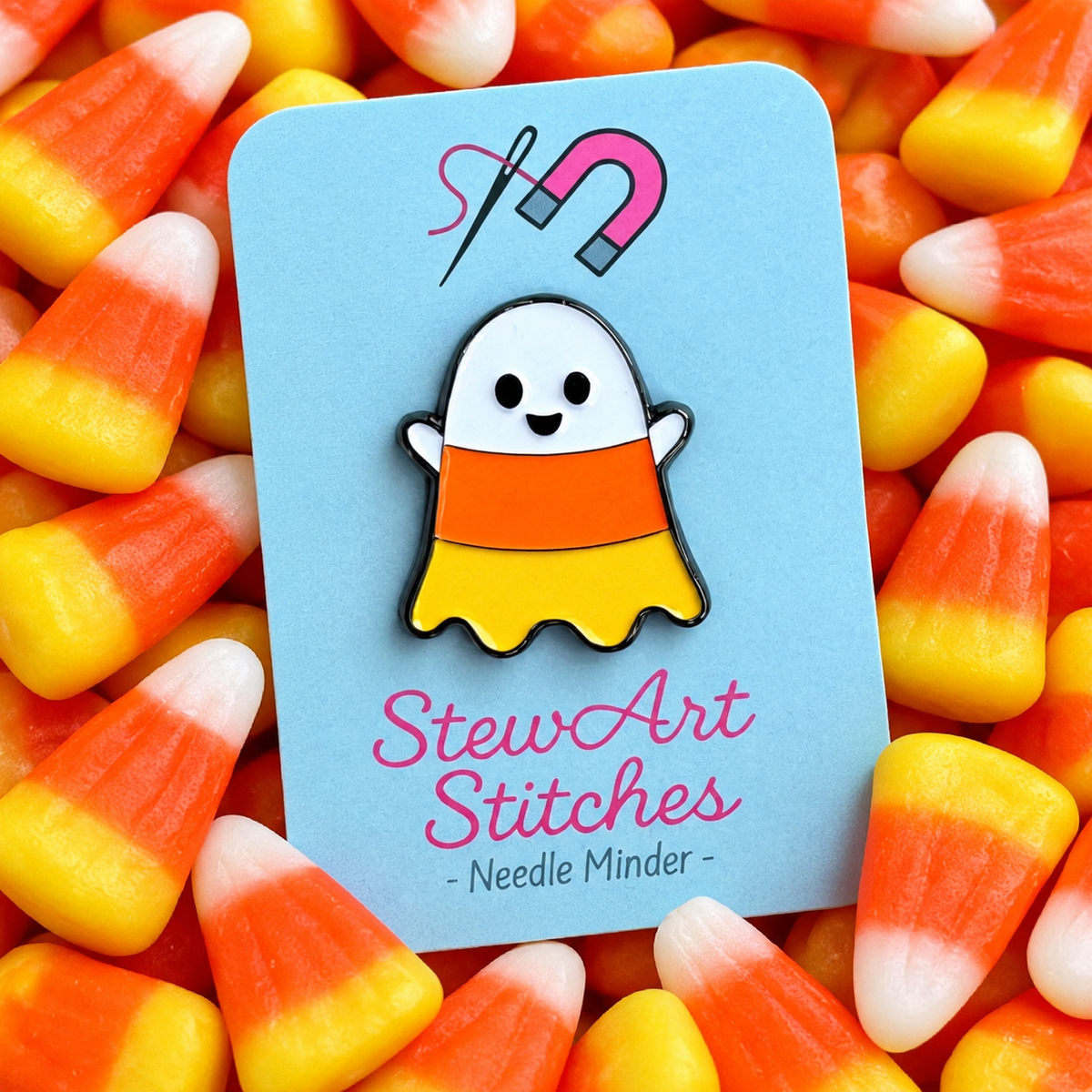 Candy corn ghost magnetic needle minder by StewArt Stitches, enamel Halloween needlework accessory for cross stitch, needlepoint and embroidery.