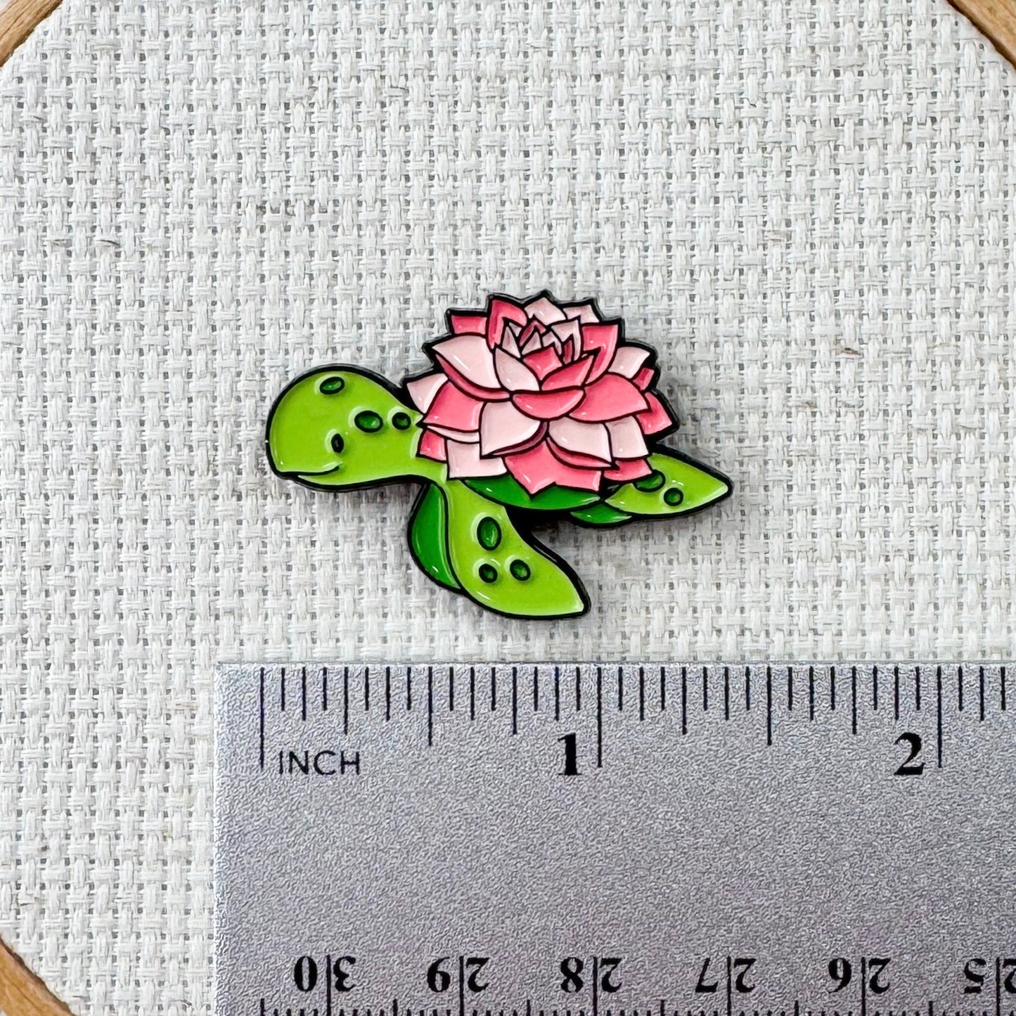 Floral turtle magnetic needle minder – cute enamel accessory with turtle and flowers for cross stitch, embroidery, and needlepoint – ocean and nature themed stitching gift.