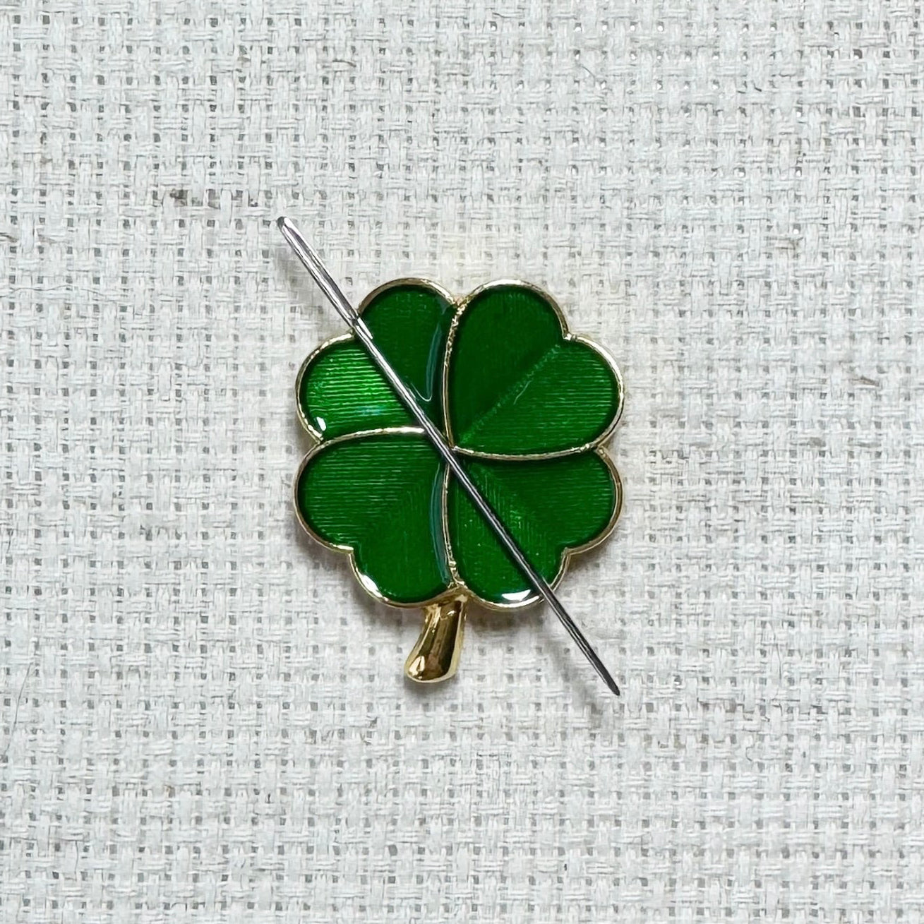 Green shamrock magnetic enamel needle minder – lucky needle holder for cross stitch, embroidery, sewing, quilting, or needlepoint. Great for St. Patrick’s Day stitching.