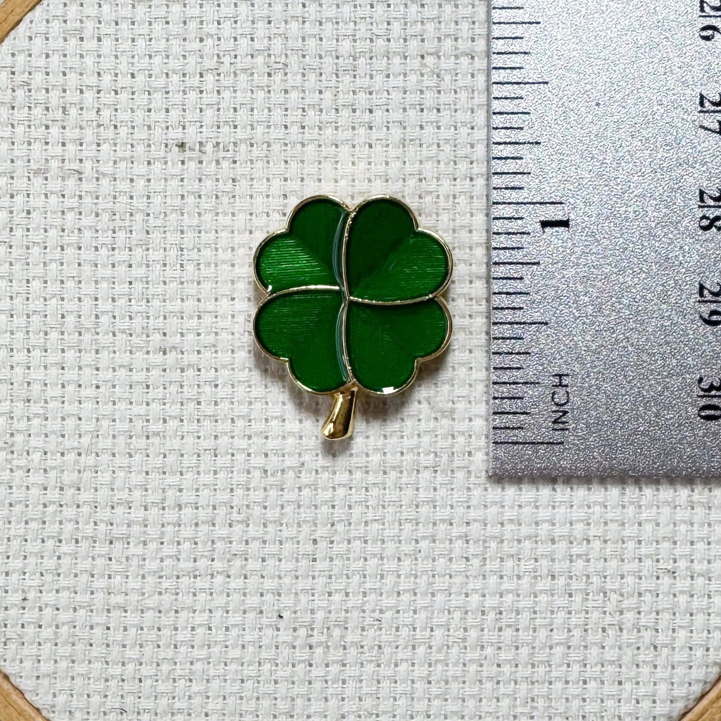 Green shamrock magnetic enamel needle minder – lucky needle holder for cross stitch, embroidery, sewing, quilting, or needlepoint. Great for St. Patrick’s Day stitching.