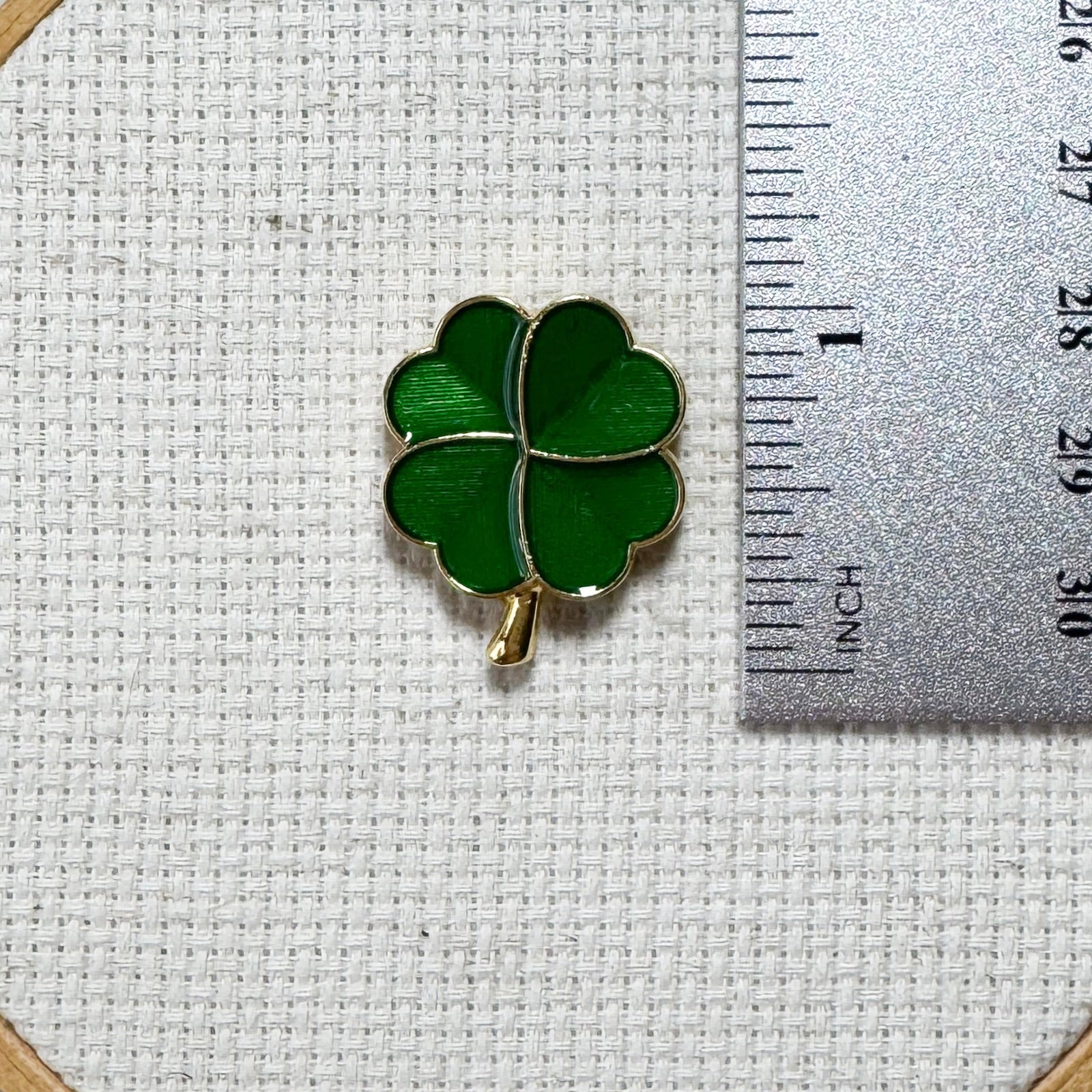Green shamrock magnetic enamel needle minder – lucky needle holder for cross stitch, embroidery, sewing, quilting, or needlepoint. Great for St. Patrick’s Day stitching.