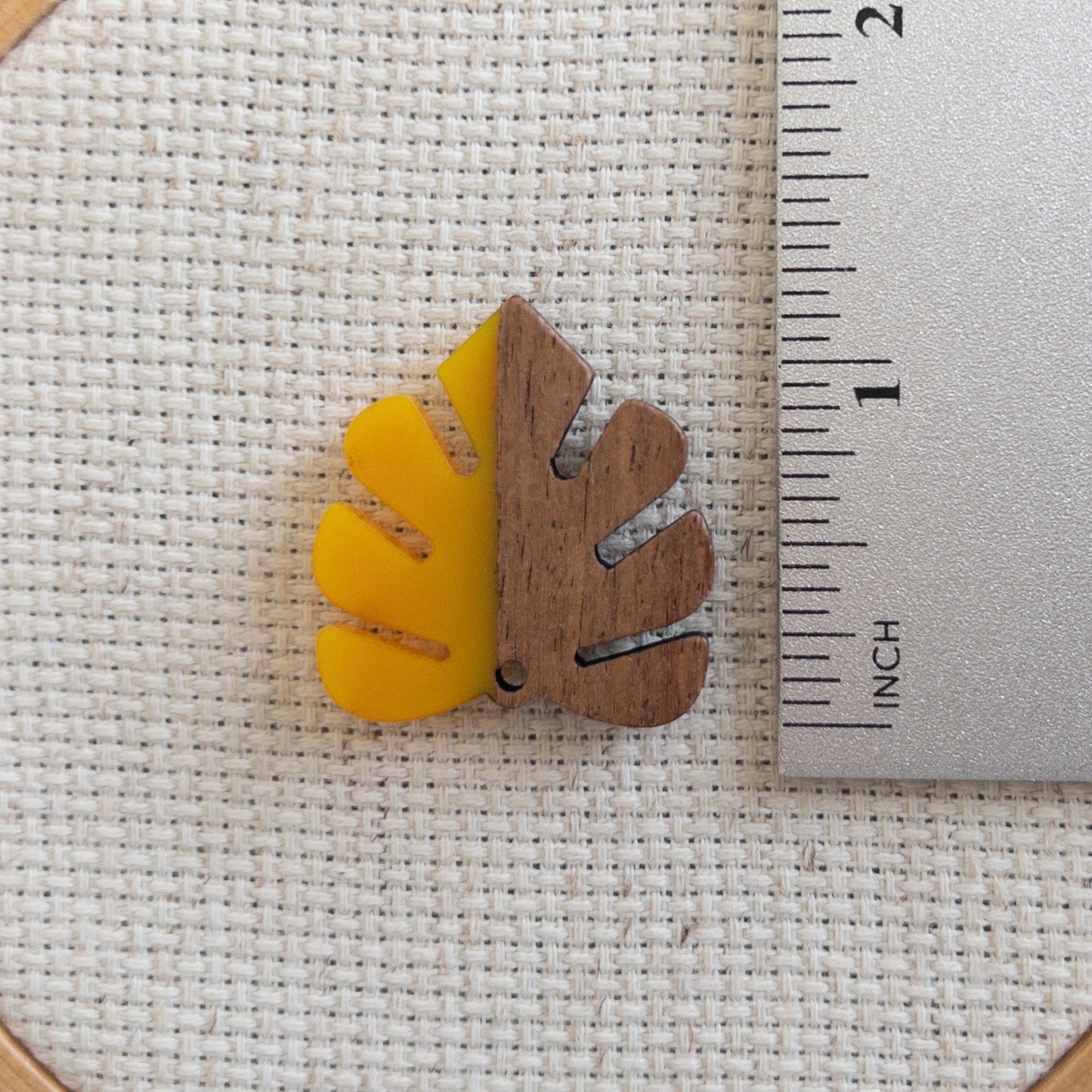 Autumn leaf magnetic needle minder made of wood and yellow resin accessory for cross stitch, embroidery, and needlepoint – fall stitching gift.