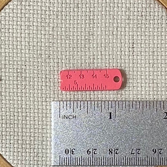 Pink and Green Measuring Tape Enamel Needle Minders - set of 2