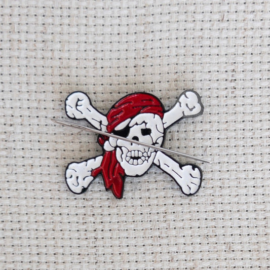 Pirate skull magnetic needle minder – enamel accessory for cross stitch, embroidery, and needlepoint – spooky nautical stitching gift for pirate lovers.