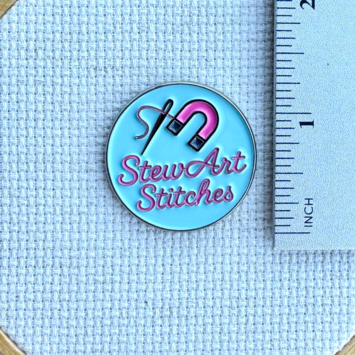StewArt Stitches Magnetic Enamal Needle Minder for needlepoint, cross stitch, embroidery and sewing projects.