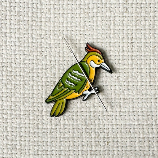Woodpecker magnetic enamel needle minder – vibrant needle holder for cross stitch, embroidery, sewing, quilting, or needlepoint. A great pick for nature lovers and birdwatching stitchers.