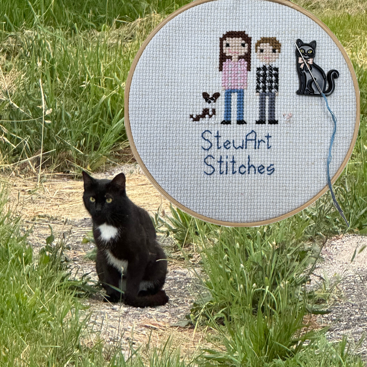 Black cat enamel magnetic needle minder holding a needle on a needlepoint canvas while stitching.