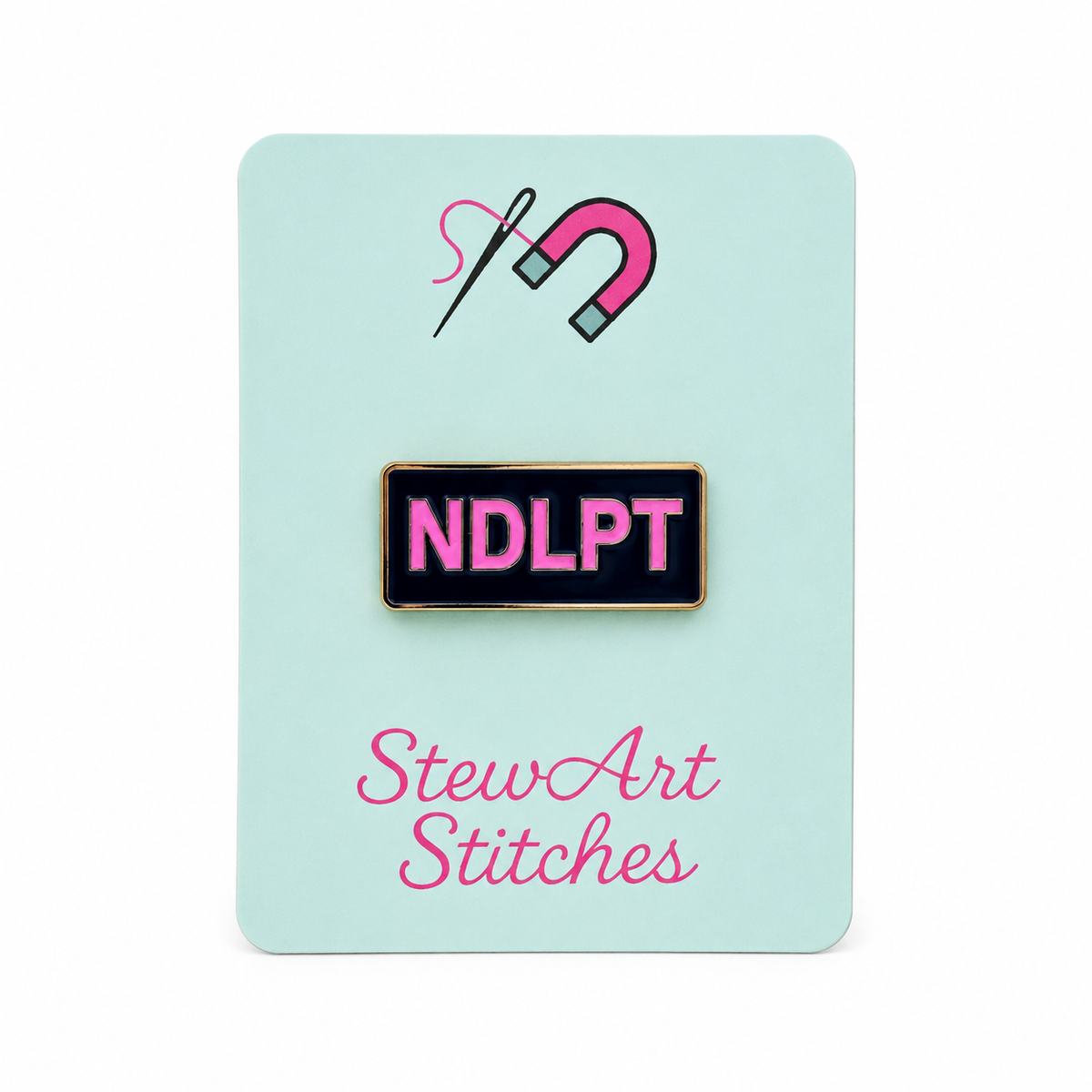 NDLPT enamel needle minder displayed on product packaging card for StewArt Stitches.
