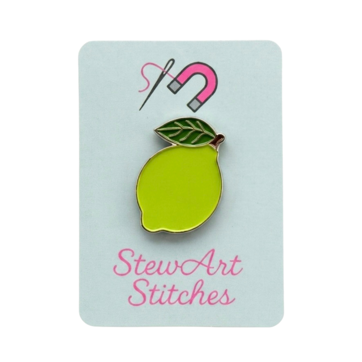 Lime magnetic enamel needle minder displayed on product packaging card for StewArt Stitches.