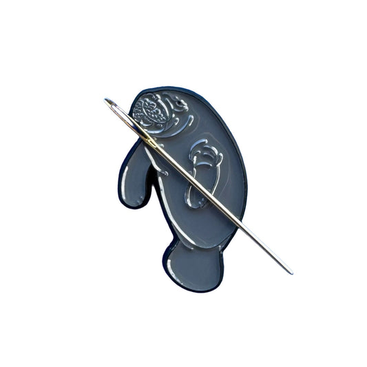 Manatee magnetic enamel needle minder for needlepoint, cross stitch, embroidery and sewing projects.