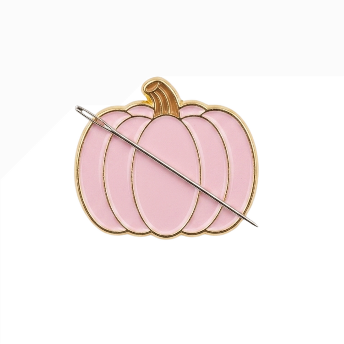Close up of pink pumpkin enamel needle minder with hard enamel finish and metal edging.